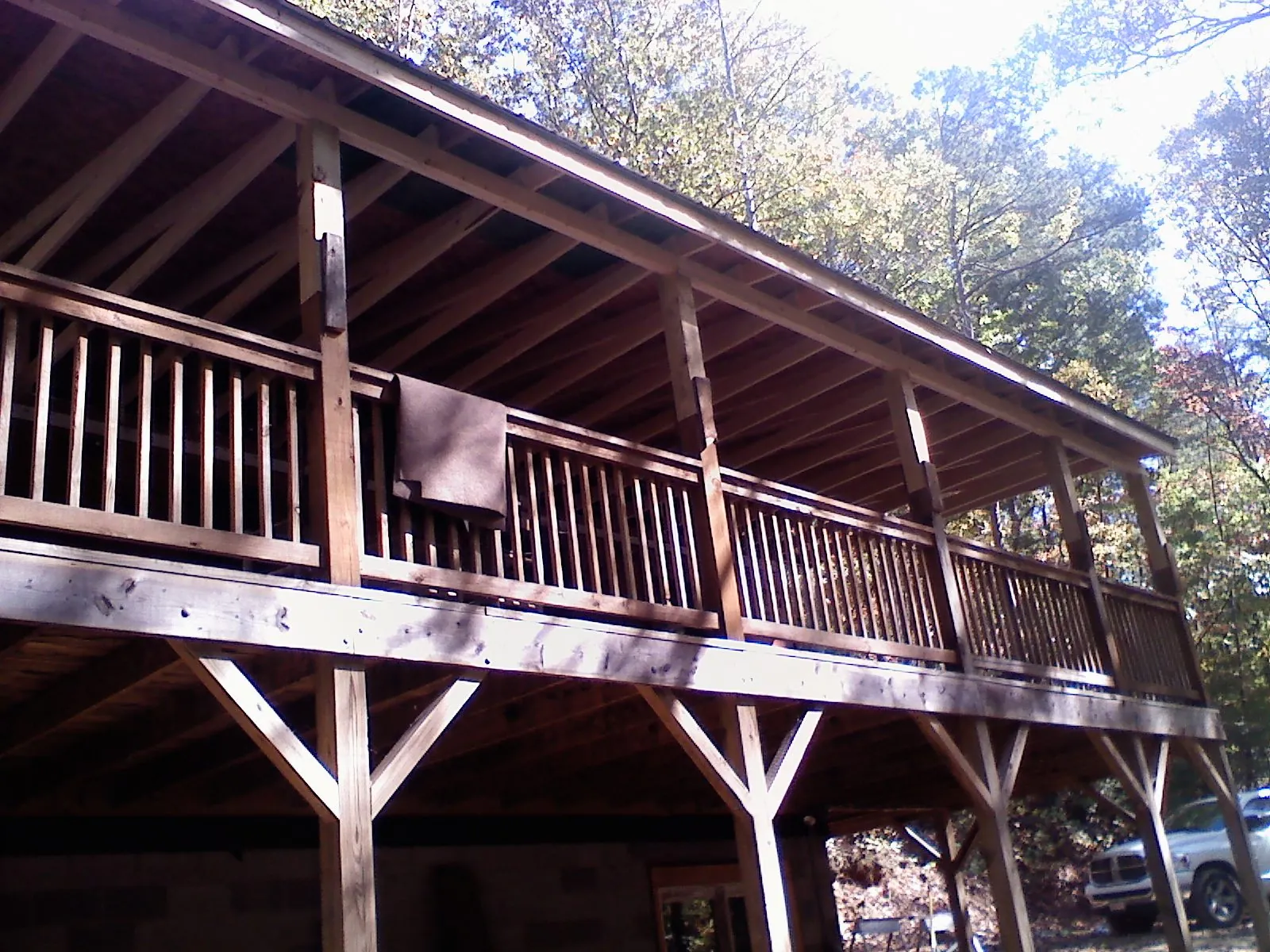 Timber framing under a new elevated porch and deck — Roof Leak Repair in Ravenna by Roofing Brothers